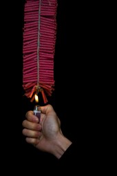 Firecrackers_lit_by_hand